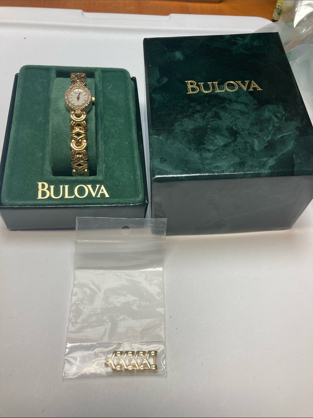 Vintage Bulova Gold Tone Ladies Bracelet Watch with shell dial, new battery